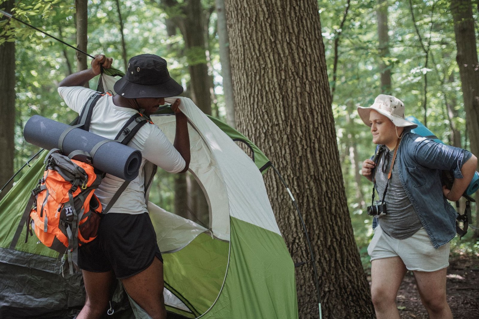 Backpacker walking through open outdoor terrain